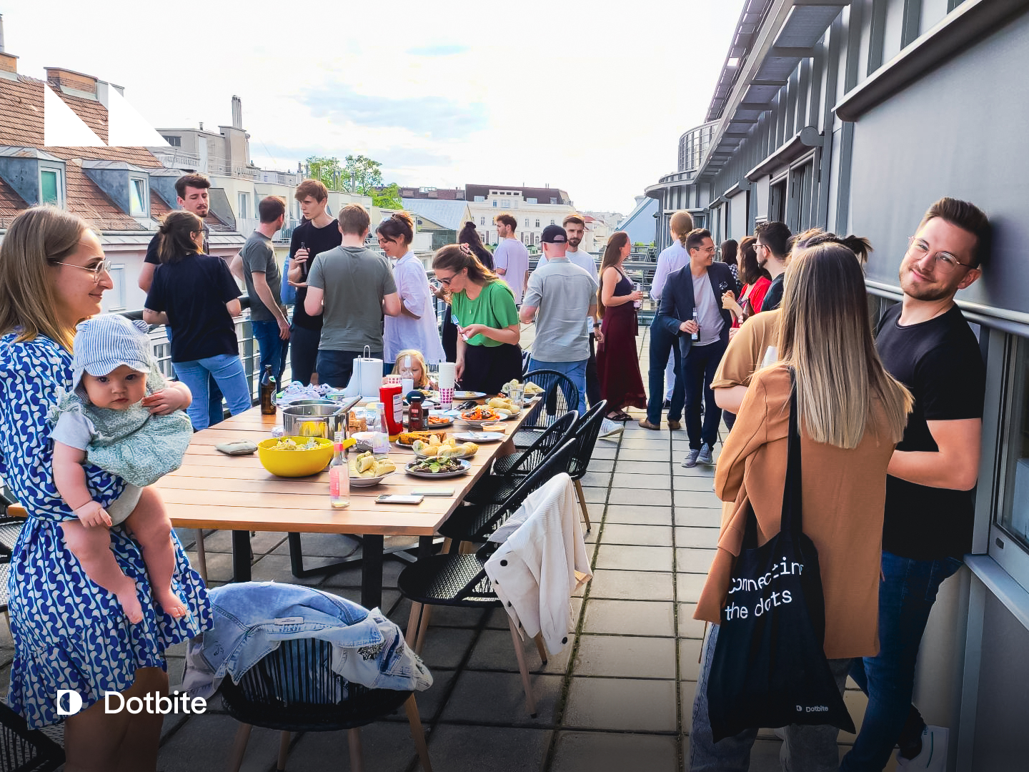 Friends and Family of Dotbite team members having a barbecue on the office terrace Friends and Family of Dotbite team members having a barbecue on the office terrace