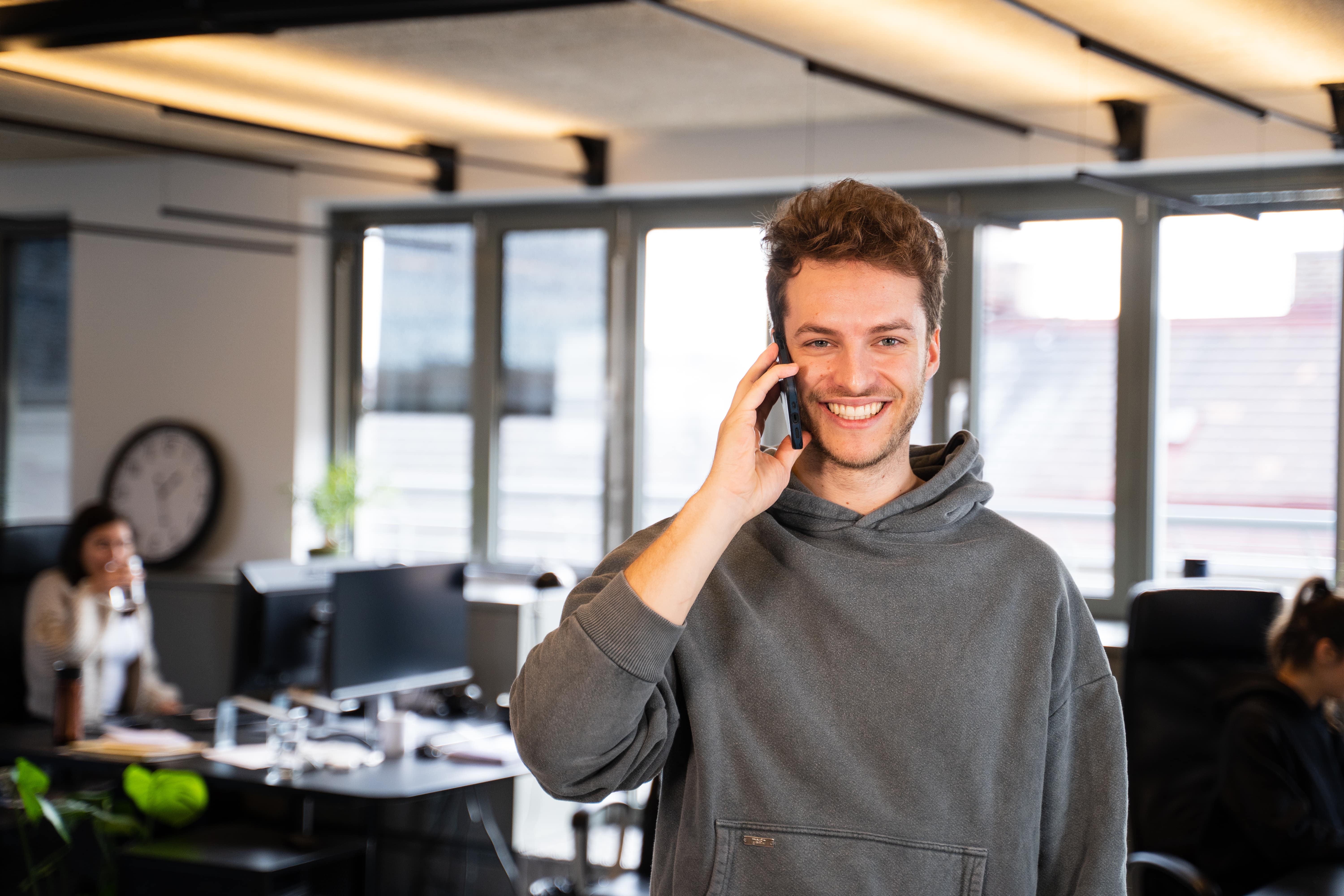 Co-founder and CTO Christoph having a phone call Co-founder and CTO Christoph having a phone call