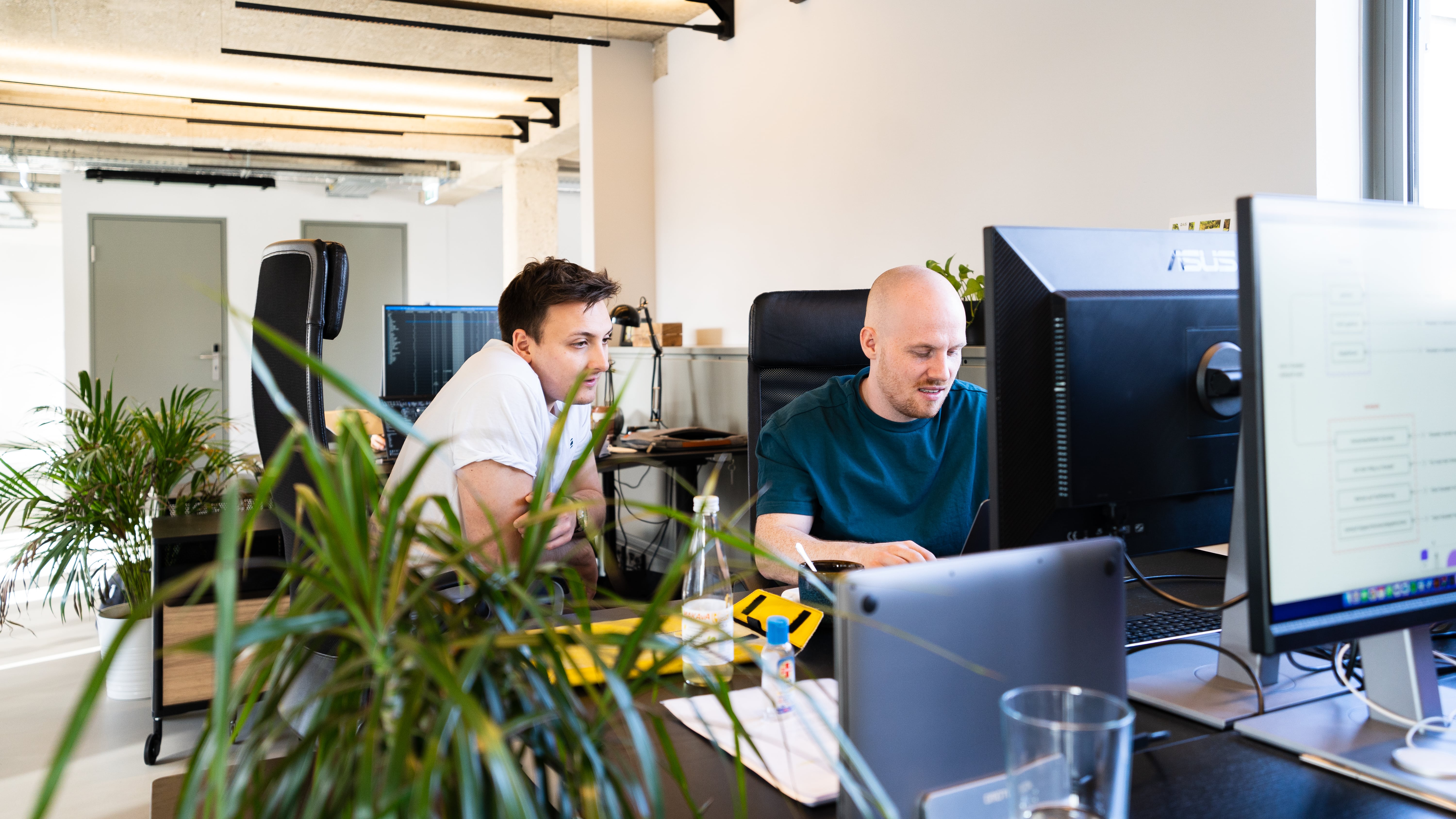 Developers discuss a complex, technical problem Developers discuss a complex, technical problem